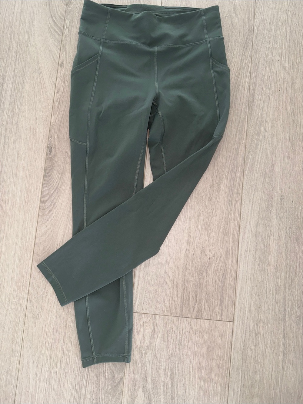 Lululemon Invigorate High-Rise Tight 25"
Smoked Spruce size 6 everlux